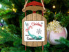 Wooden sleigh ornament with "Merry Christmas From Sanibel Island" text.