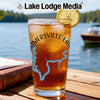 Glass of iced tea with "Ammersville Lake" map design and lemon slice.