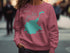 Teal Timothy Lake Oregon map on pink sweatshirt.