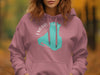 Pink hooded sweatshirt with Emerald Lake, Canada graphic and compass rose.