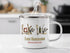 Enamel mug with "Lake Sammamish Washington" text and nautical graphics.
