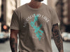 Moosehead Lake Maine distressed compass graphic on a tan t-shirt.