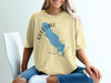 Yellow t-shirt with blue Gull Lake map graphic and compass rose.