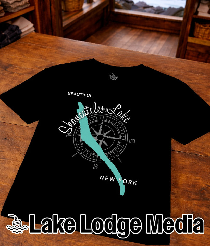 Black t-shirt with "Beautiful Skaneateles Lake" and compass design.