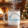 White mug with Lake Ossawinnamak ee, Minnesota map and compass graphic.