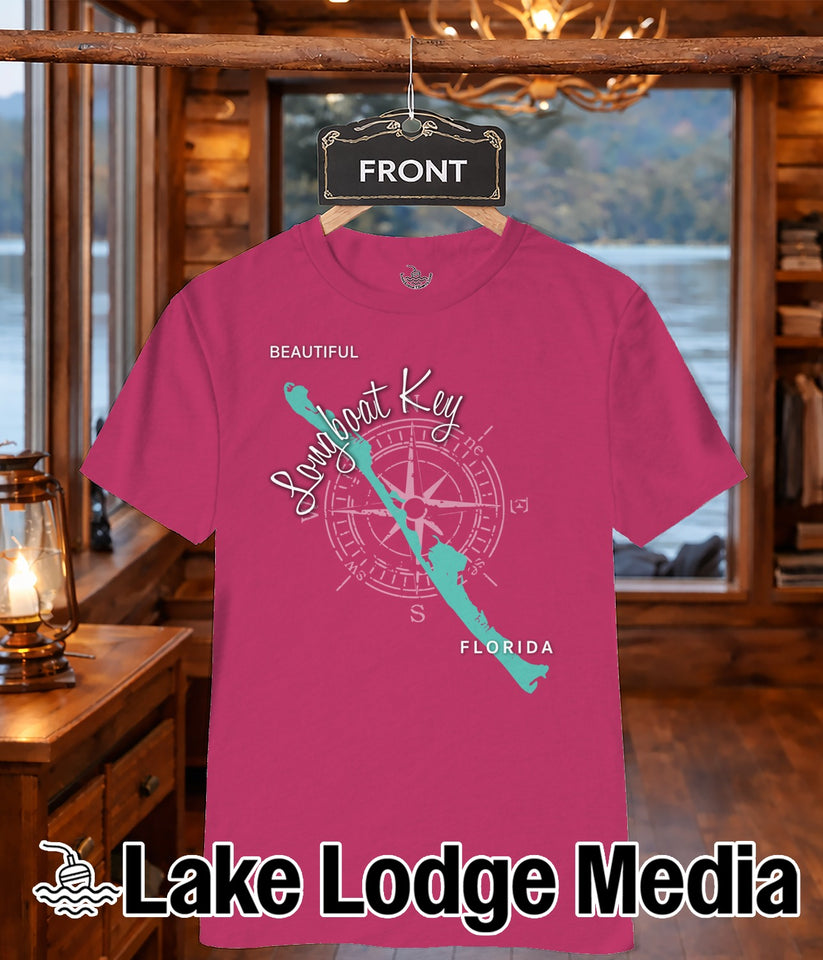 Pink t-shirt with "Lake Lodge Media" and a compass rose design.
