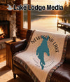 Throw blanket featuring a teal map of Newfound Lake, NH, on a cream background.