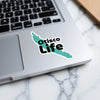 Turquoise outline of Otisco Lake with text "Otisco Life" on a laptop.