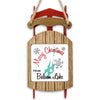 Red and wood Christmas ornament shaped like a sled with snowflakes and "Merry Christmas From Balsam Lake."