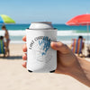 White can koozie with Lake Charleston Ontario map and compass design on a beach.