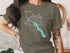 T-shirt featuring a turquoise map of Saylorville Lake, Iowa, with a compass rose.