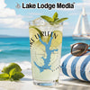 Glass with Lake Lurleen graphic, ice, lime, mint, and Lake Lodge Media text.