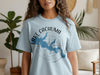 Light blue t-shirt with "Lake Cachuma California" and a blue lake map graphic.