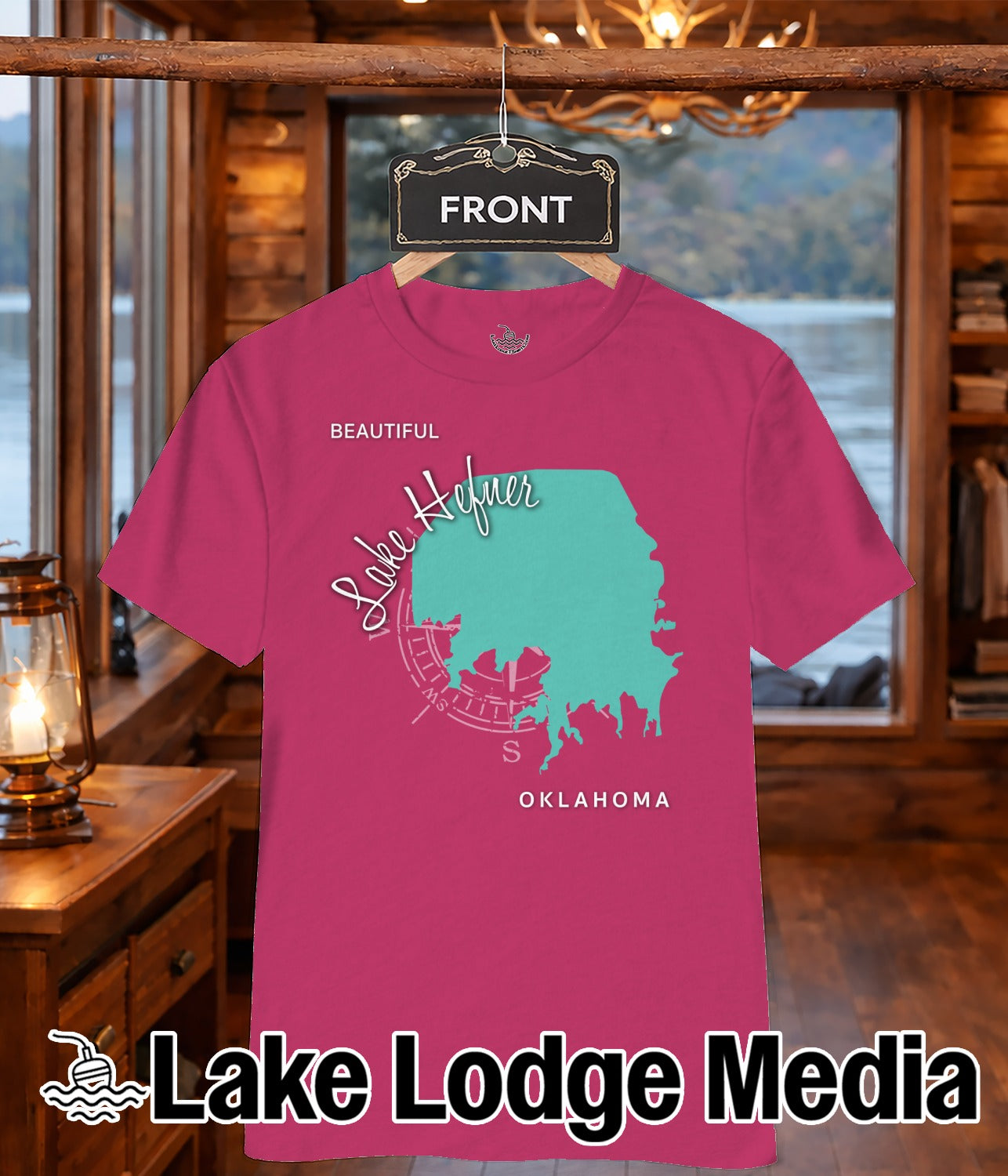 Pink t-shirt with teal Oklahoma lake graphic and "Lake Lodge Media" logo.