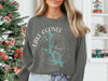 Dark gray sweatshirt with Lake Oconee Georgia map design and compass graphic.