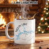White mug with Nolin Lake map and compass, steaming coffee, and Christmas tree.