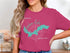 Pink t-shirt featuring a stylized map of Ashokan Lake, New York.