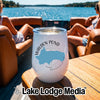 A white insulated tumbler featuring a Walden Pond map design sits on a wooden boat table.