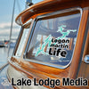 Turquoise lake outline sticker with text "Logan martin Life" on a boat window.