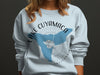Light blue sweatshirt with Lake Cuyamaca California map and compass graphic.