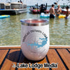 A white insulated tumbler with a compass graphic and Wright Patman Lake Texas text on a wooden surface.