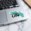 Wawasee Life sticker on a laptop keyboard.