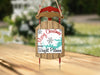 Christmas ornament shaped like a sled with "Merry Christmas from Wright Patman" text.