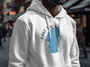 White hoodie with a blue Lake Tahoe graphic and compass rose design.