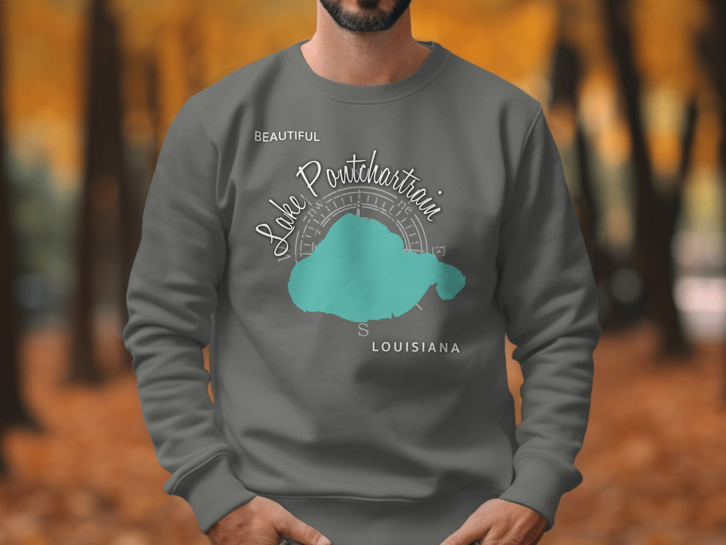 Grey sweatshirt with Lake Pontchartrain map and compass design.