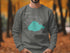 Grey sweatshirt with Lake Pontchartrain map and compass design.