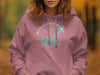 Rose pink hoodie with Possum Kingdom Lake Texas compass graphic.