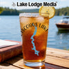 Iced tea in a glass with a lemon slice and a map of Sebago Lake, Maine.