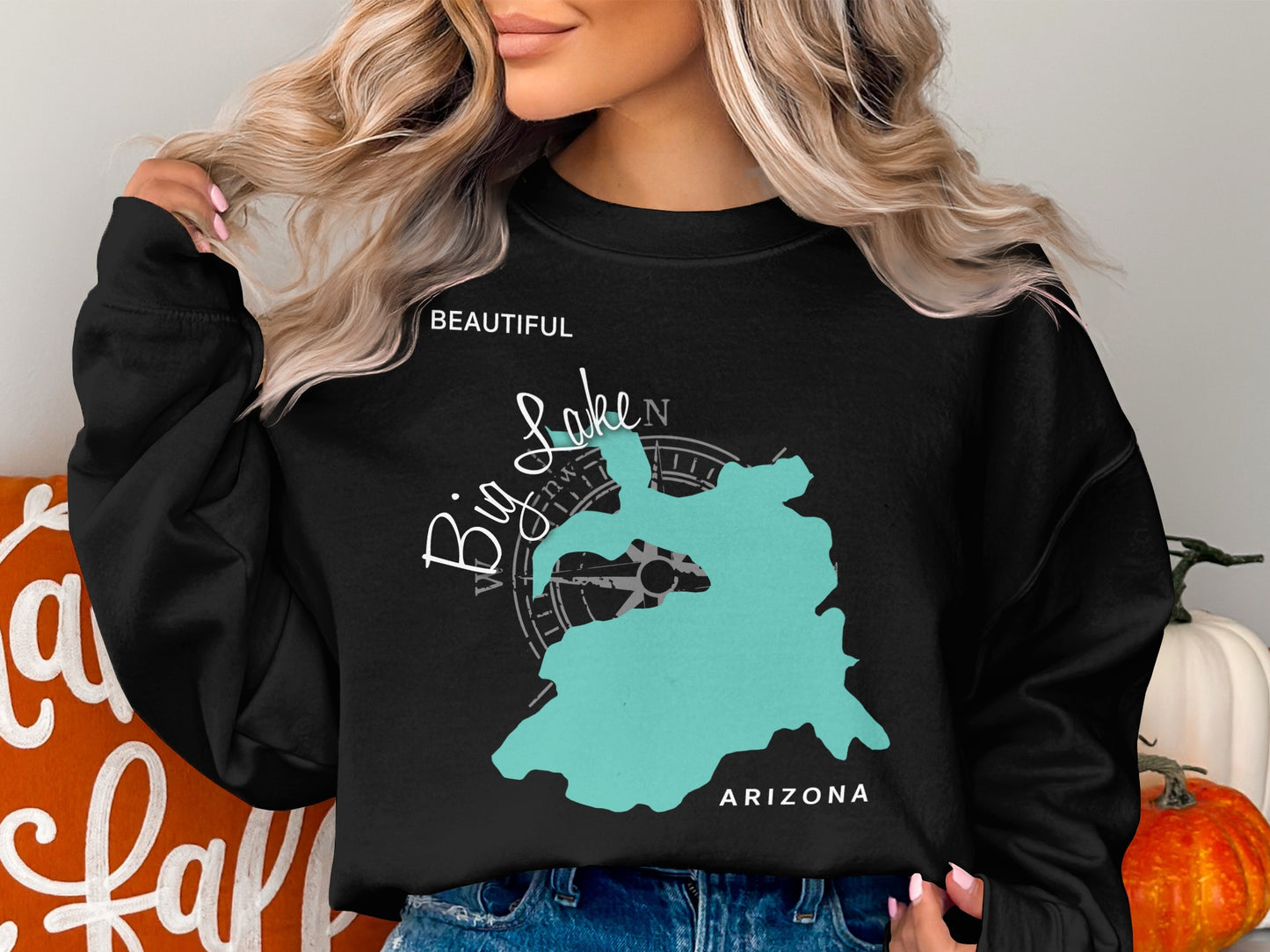 Black sweatshirt with a teal map outline of Big Lake, Arizona.