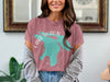 Pink t-shirt with turquoise Lake Huron map graphic and "Michigan" text.