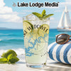 Glass with "Lake Wedowee" and Alabama map on a beach with sunglasses.