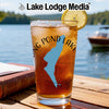 Glass of iced tea with lemon, "Wing Pond Lake" map graphic, and "Lake Lodge Media" text.
