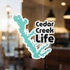 Sticker of Cedar Creek outline and text "Cedar Creek Life"