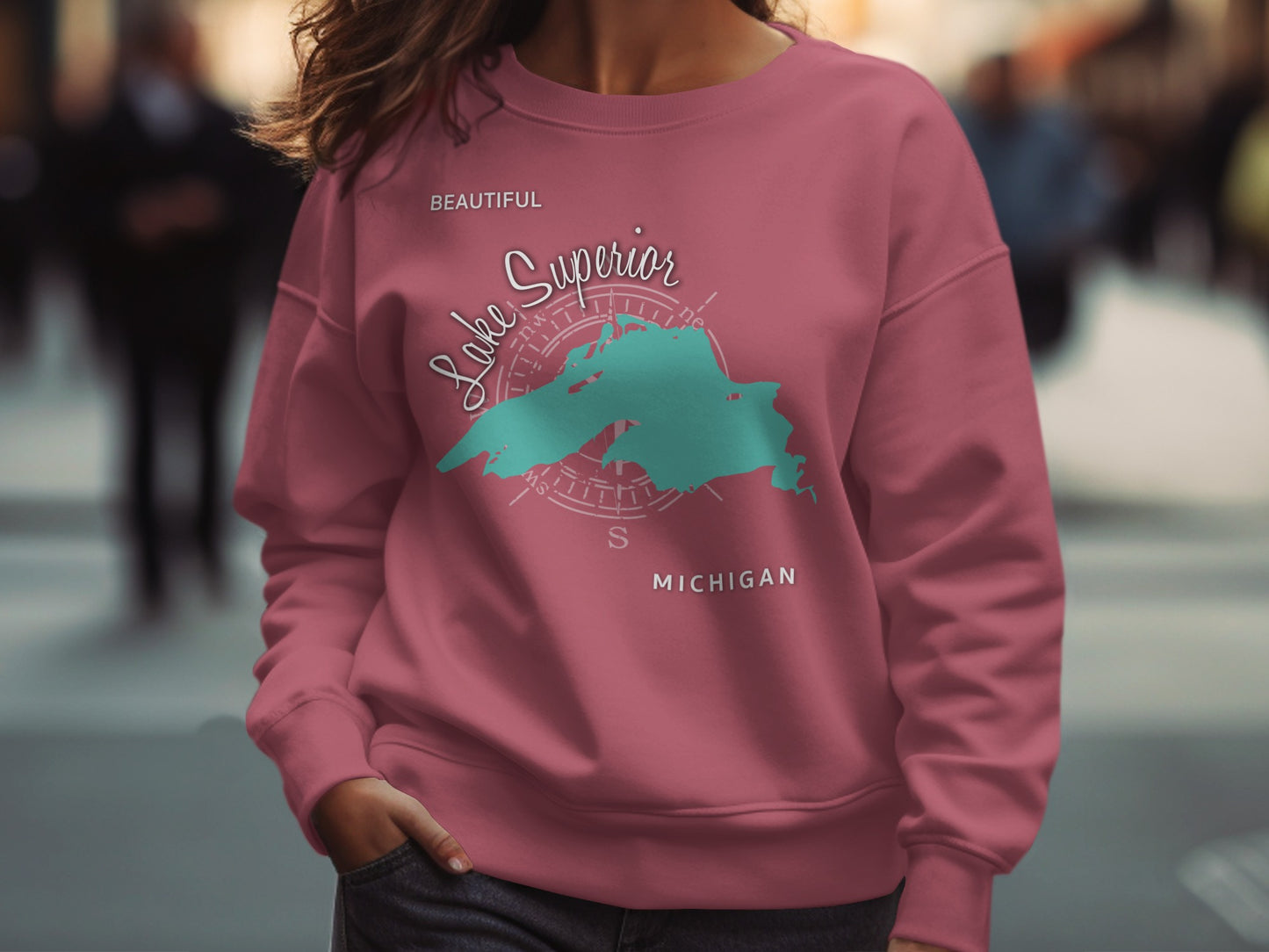 Pink sweatshirt with "Lake Superior Michigan" and compass graphic.