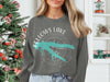 Crewneck sweatshirt with "FELLOWS LAKE MISSOURI" and turquoise lake outline graphic.