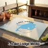 Tempered glass cutting board featuring a blue map of Lake Simcoe and a compass rose.
