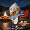 Ice cream sundae with caramel and whipped cream, campfire, lake, and s'mores supplies.