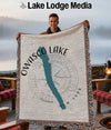 Woven blanket featuring the shape of Owasco Lake, New York and a compass rose.