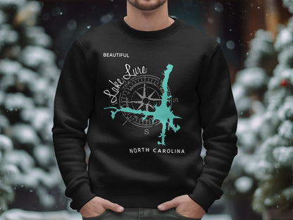 Black sweatshirt with a cyan lake map and compass design, "Lake Lure" and "North Carolina" text.