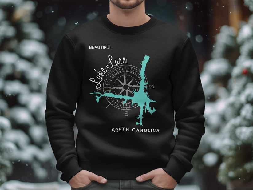 Black sweatshirt with a cyan lake map and compass design, "Lake Lure" and "North Carolina" text.