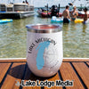 White insulated wine tumbler with a Lake Michigan map graphic resting on a boat deck.