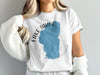 White t-shirt with blue Lake Tahoe map and "LAKE TAHOE CALIFORNIA" text.