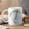 White mug with Lake Okanagan map design and compass.