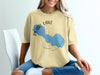 Light yellow t-shirt with Pearl Lake Wisconsin map and compass design.
