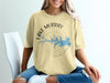 Cream t-shirt with Lake Murray, South Carolina map and compass graphic.