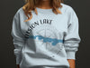 Light blue sweatshirt with "Hartsell Lake New Jersey" graphic and compass rose.